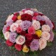 Cousin funéraire de roses multicolores